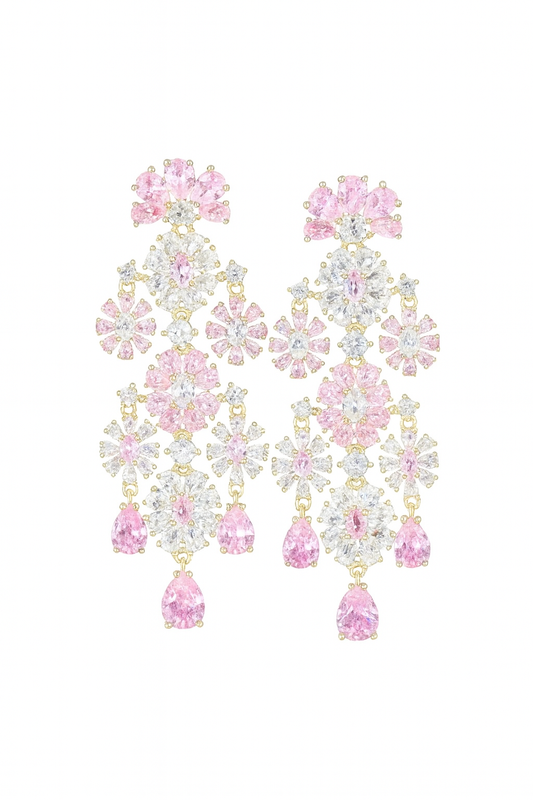 Gold-colored long flower-shaped earrings with pink zirconias