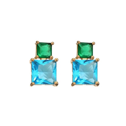 Gold-colored earrings with blue and green zirconias