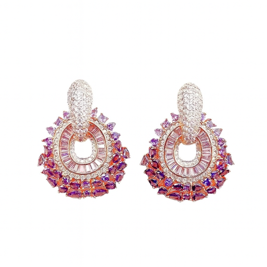 Rose gold-colored earrings with pink zirconias