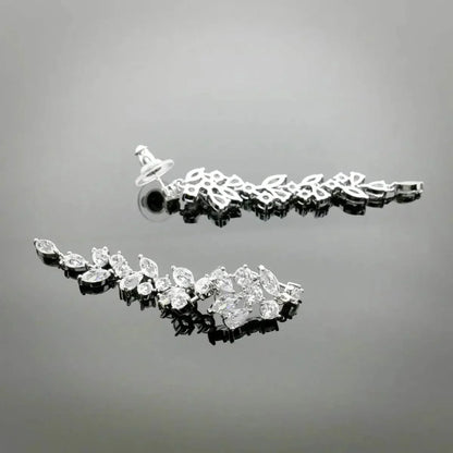 Silver-colored leaf dance earrings with zirconia