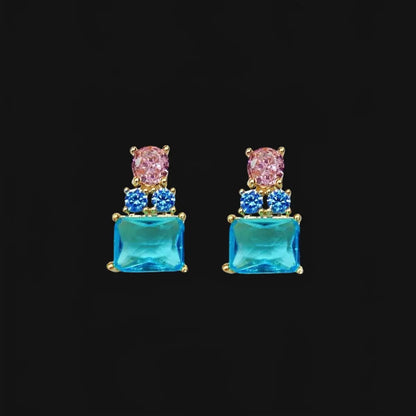 Gold-colored earrings with pink and blue zirconias